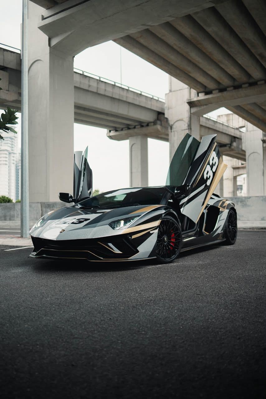 Rent a 2022 Lamborghini Aventador S in Kuala Lumpur — Naturally aspirated V12, scissor doors, pure drama.