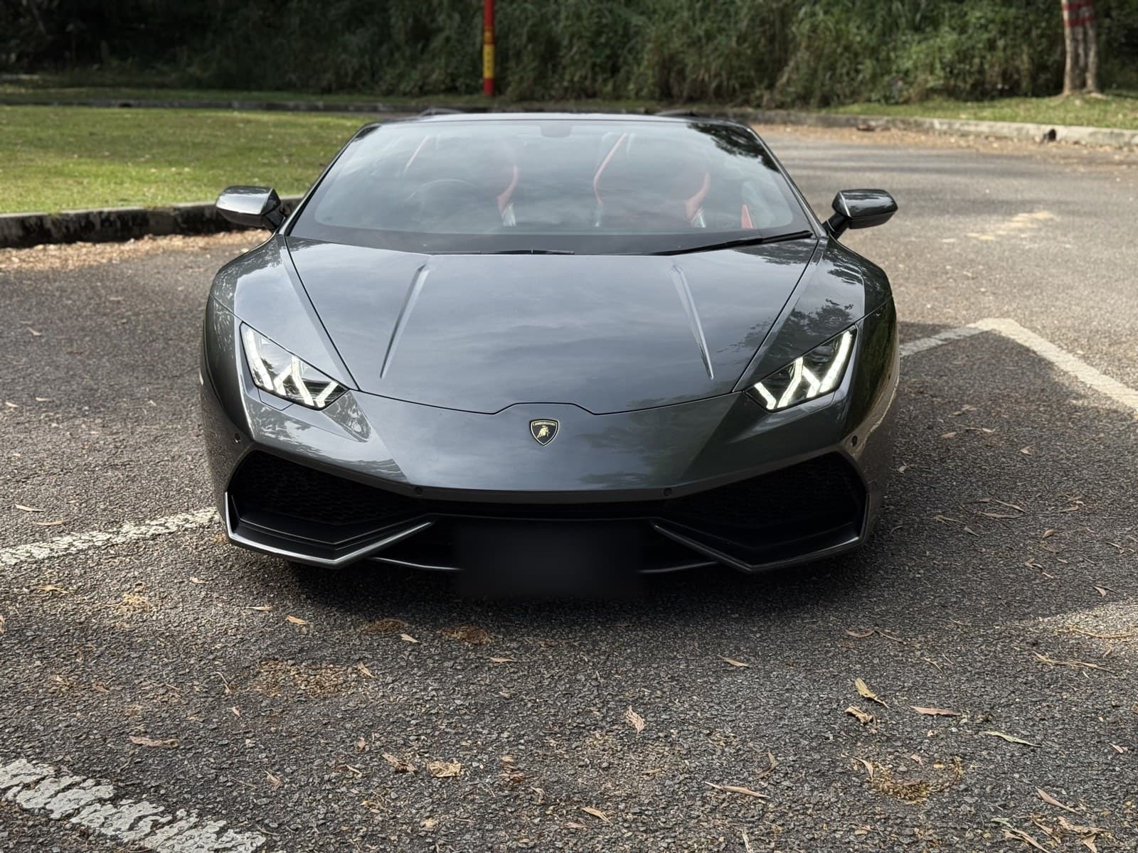 Rent a 2022 Lamborghini Huracán Spyder in Kuala Lumpur — Open-top V10 drama for golden hour.