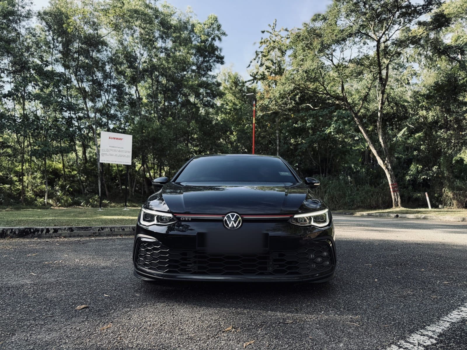 Rent a 2023 Volkswagen Golf GTI in Kuala Lumpur — The original hot hatch, Mk8 sharp.